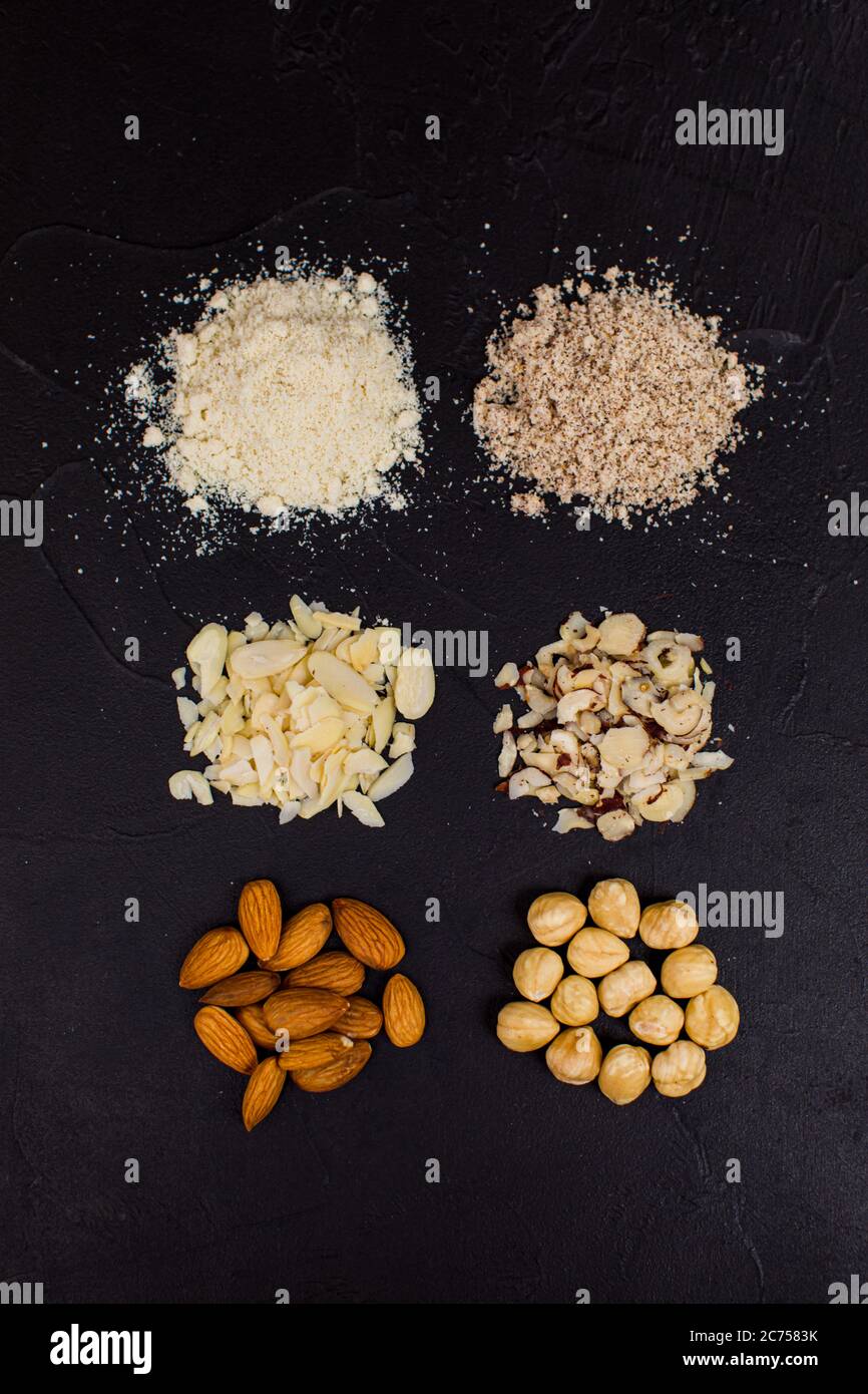 Peanuts, almonds and hazelnuts in various forms Stock Photo