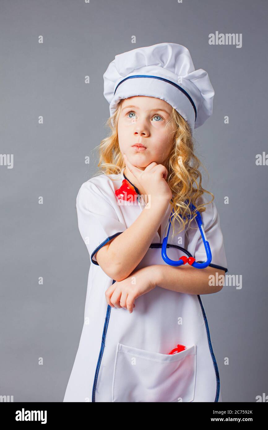 The little girl dream of becoming a doctor Stock Photo - Alamy