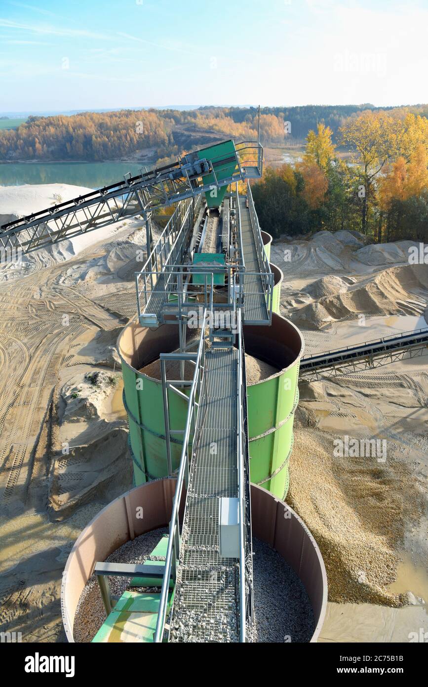 Building and conveyor system in a gravel pit - open-cast mine for sand and gravel Stock Photo