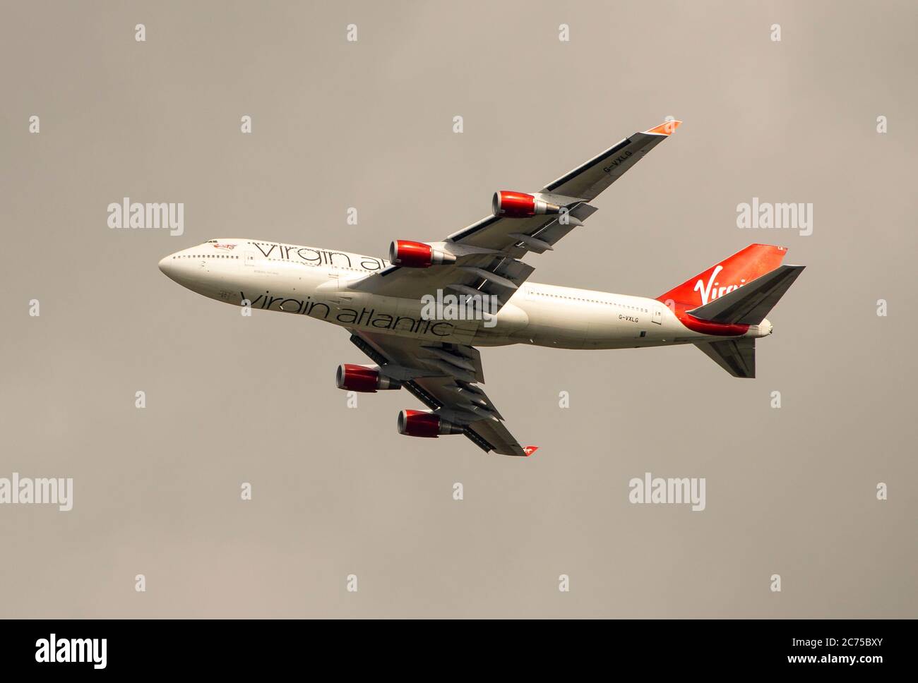 A Virgin Atlantic Boeing 747-400 jet plane taking off from Manchester Airport, England, United Kingdom. Stock Photo