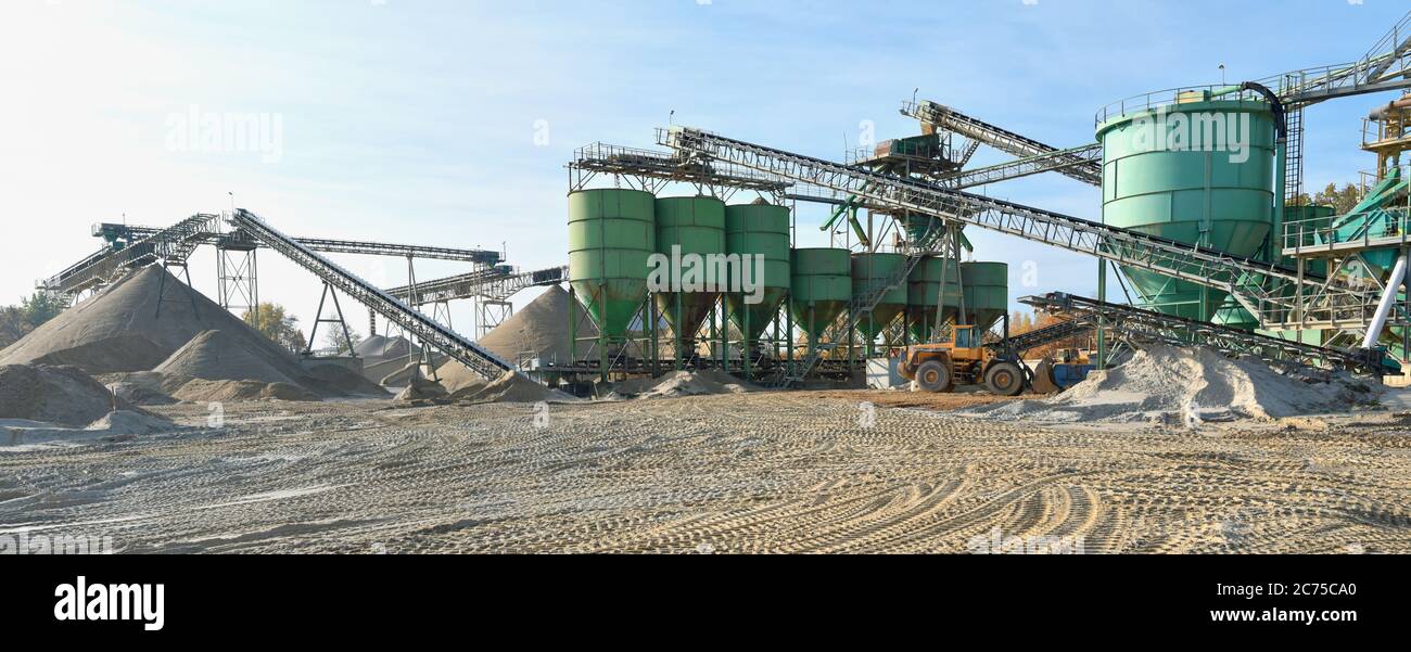 Building and conveyor system in a gravel pit - open-cast mine for sand and gravel Stock Photo