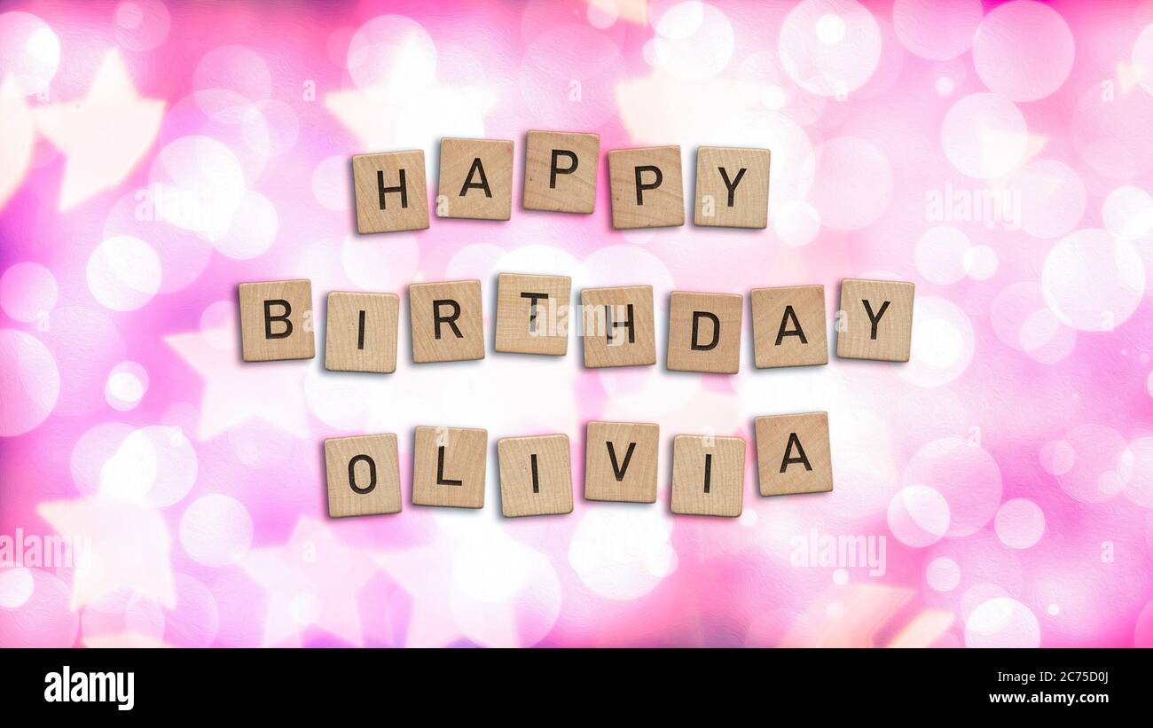 Happy Birthday Olivia card with wooden tiles text. Girls birthday card