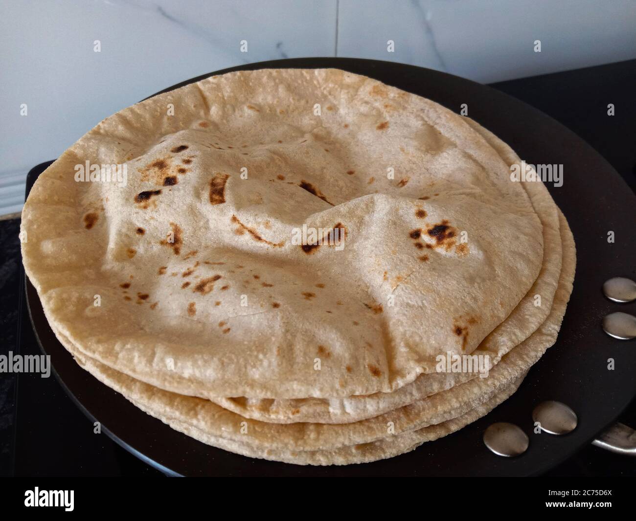 indian bread or roti made from whole wheat flour  or refind flour dough without added yeast Stock Photo