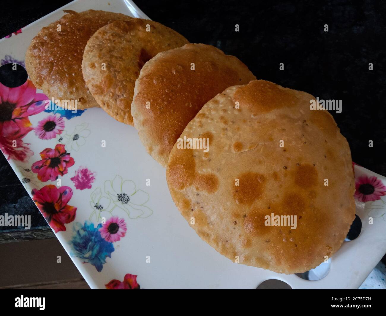 indian side dish wheat flour dough poori Stock Photo