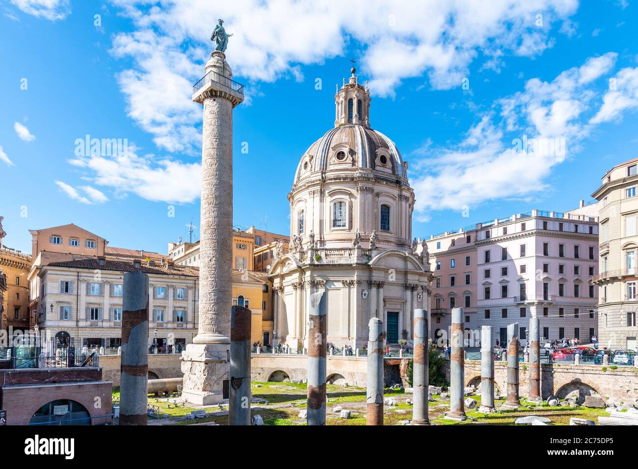 Trajan's Column, Italian: Colonna Traiana, and Church of the Most Holy Name of Mary at the Trajan Forum, Italian: Santissimo Nome di Maria al Foro Traiano. Rome, Italy Stock Photo