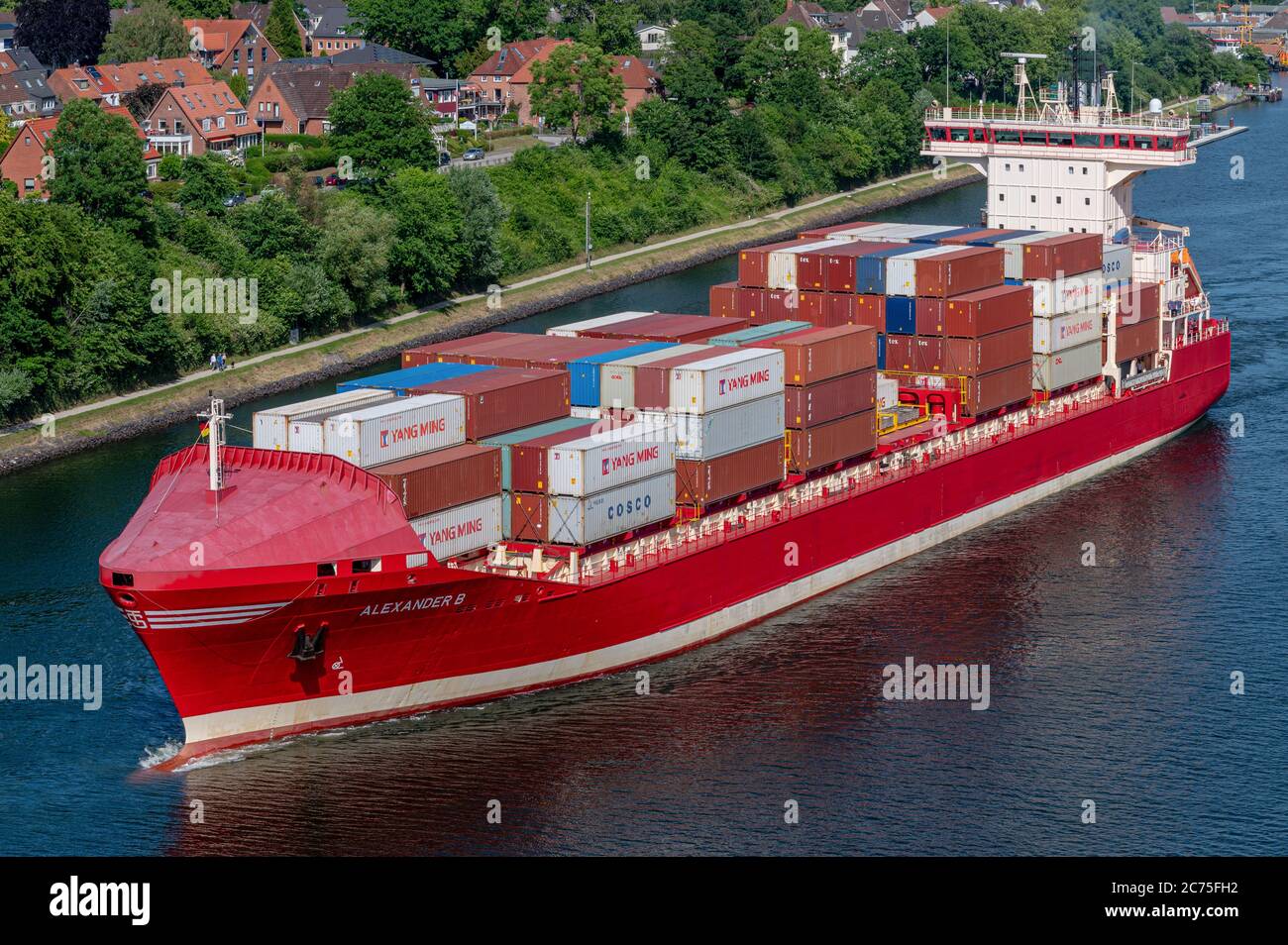Containerfeeder Alexander B passing the Kiel Canal Stock Photo
