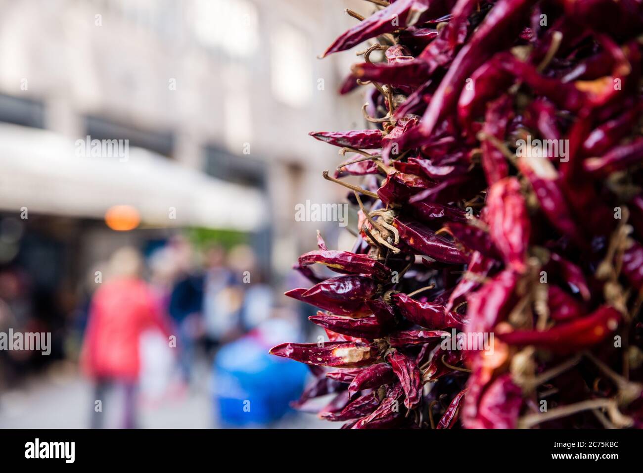 Garlands of red dried paprika pods in Budapest spice shop, Hungary with ...