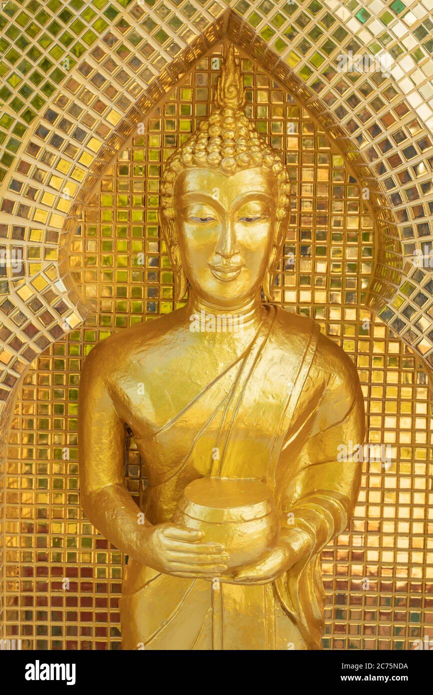 golden buddha image statue in south of Thailand Stock Photo - Alamy