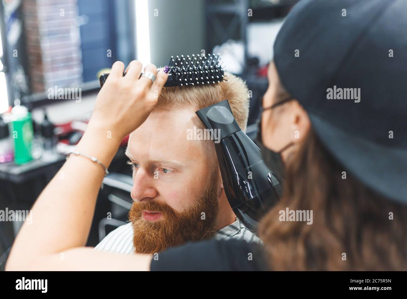 Portrait Of A Customer With A Female Hairdresser In A Salon Stock Photo portrait-of-a-customer-with-a-female-hairdresser-in-a-salon-stock-photo