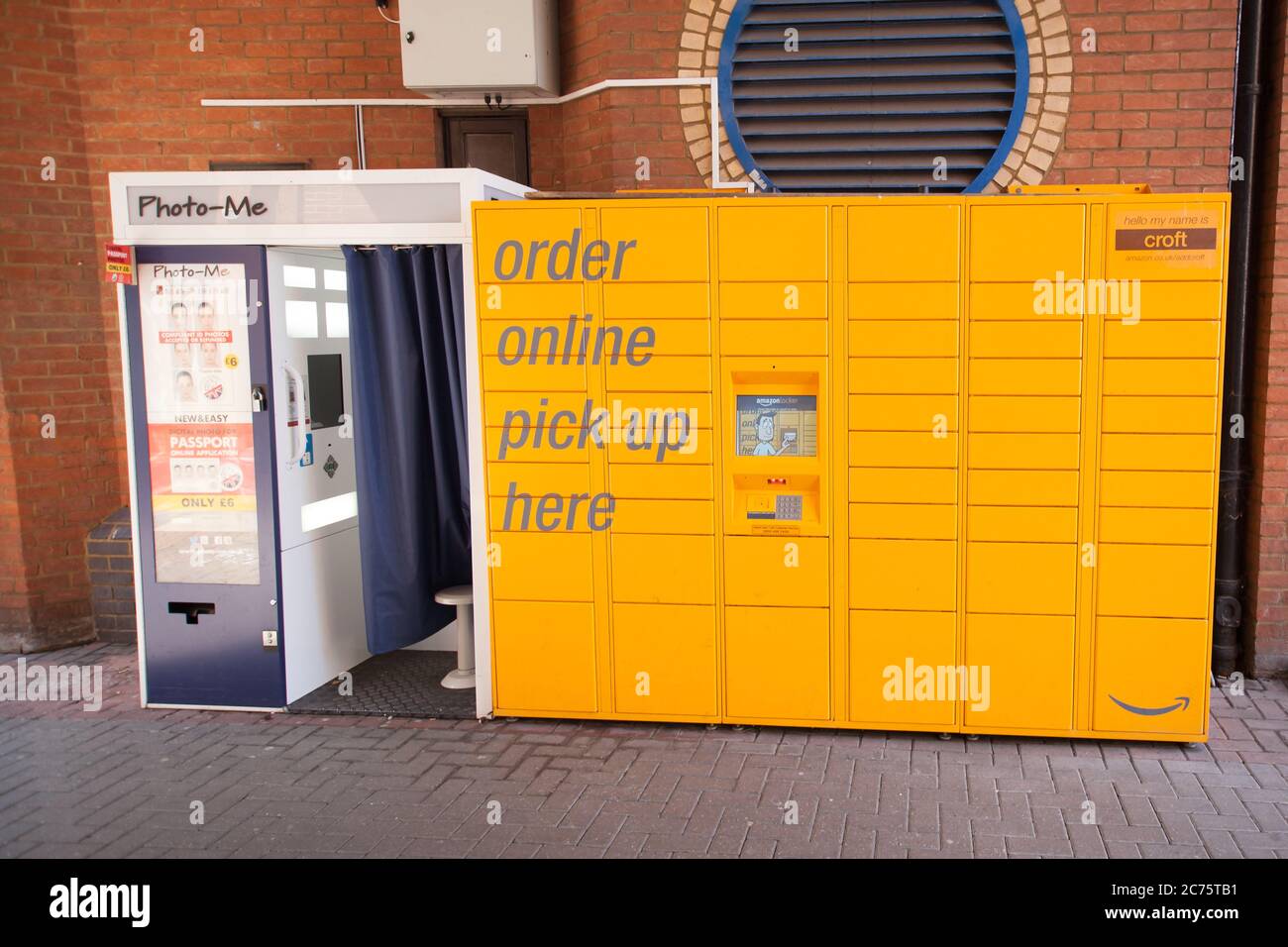 A photo me booth and an Amazon locker point in Oxford in the UK Stock Photo