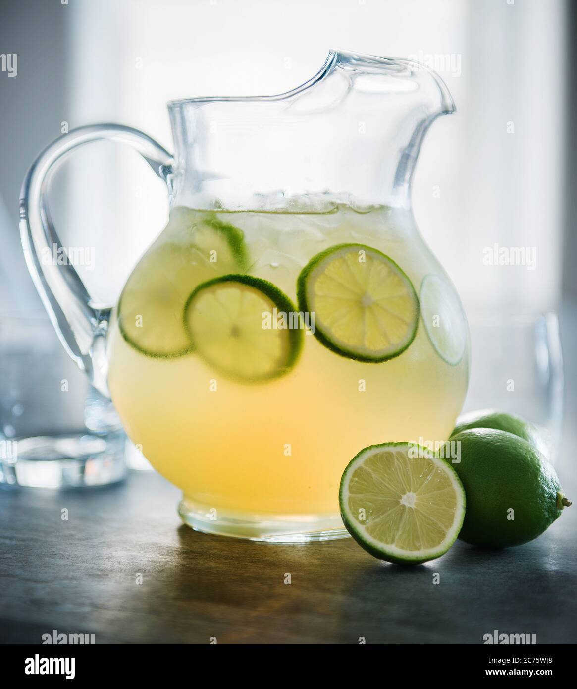 Pitcher of margaritas with lime Stock Photo Alamy