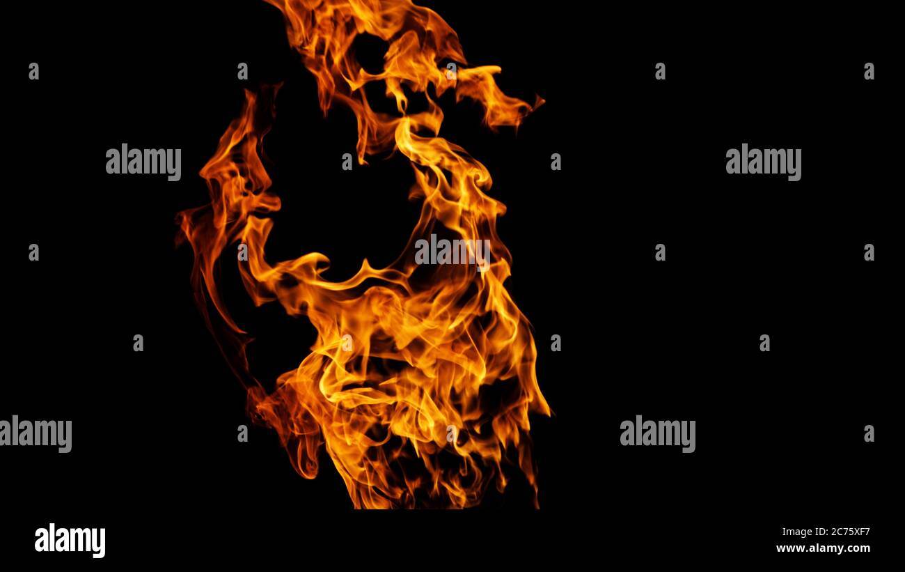 Fire flames on black background isolated. Burning gas or gasoline burns with fire and flames. Flaming burning sparks close-up, fire patterns. Infernal Stock Photo