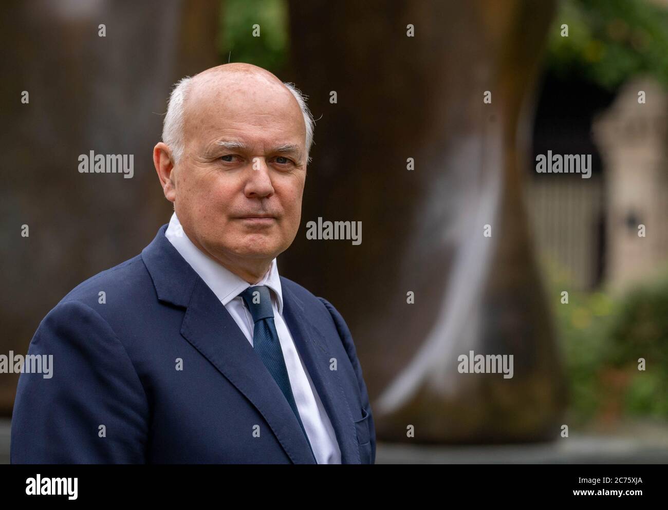 London, UK. 14th July, 2020. MP's in Westminster, Iain Duncan Smith Conservative MP for Chingford and Woodford and former leader of the Conservative party. He is pictured on College Green Westminster giving an interview on the Huawei UK 5G ban Credit: Ian Davidson/Alamy Live News Stock Photo