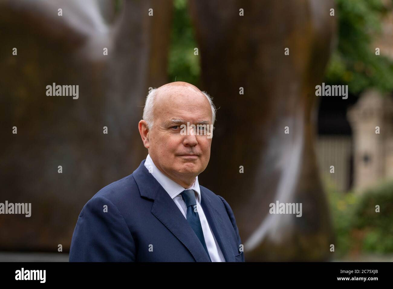 London, UK. 14th July, 2020. MP's in Westminster Iain Duncan Smith Conservative MP for Chingford and Woodford and former leader of the Conservative party. He is pictured on College Green Westminster giving an interview on the Huawei UK 5G ban Credit: Ian Davidson/Alamy Live News Stock Photo