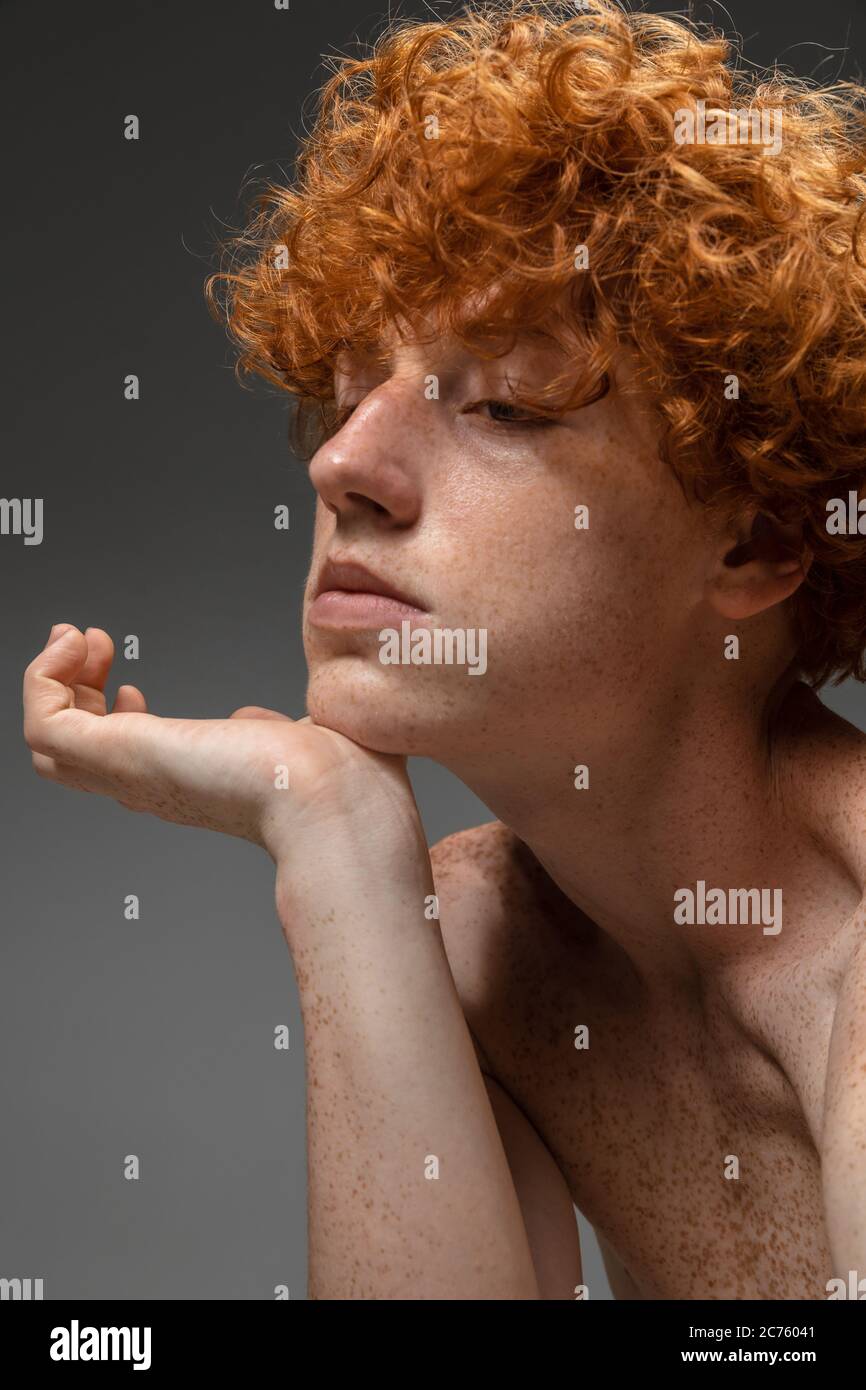 Curly redhead man with freckles hi-res stock photography and images - Alamy