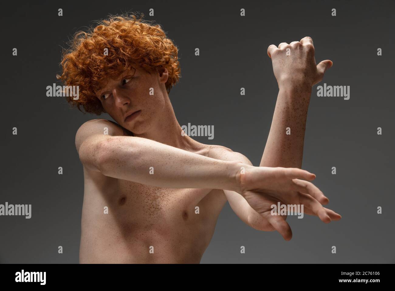 Curly redhead man with freckles hi-res stock photography and images - Alamy