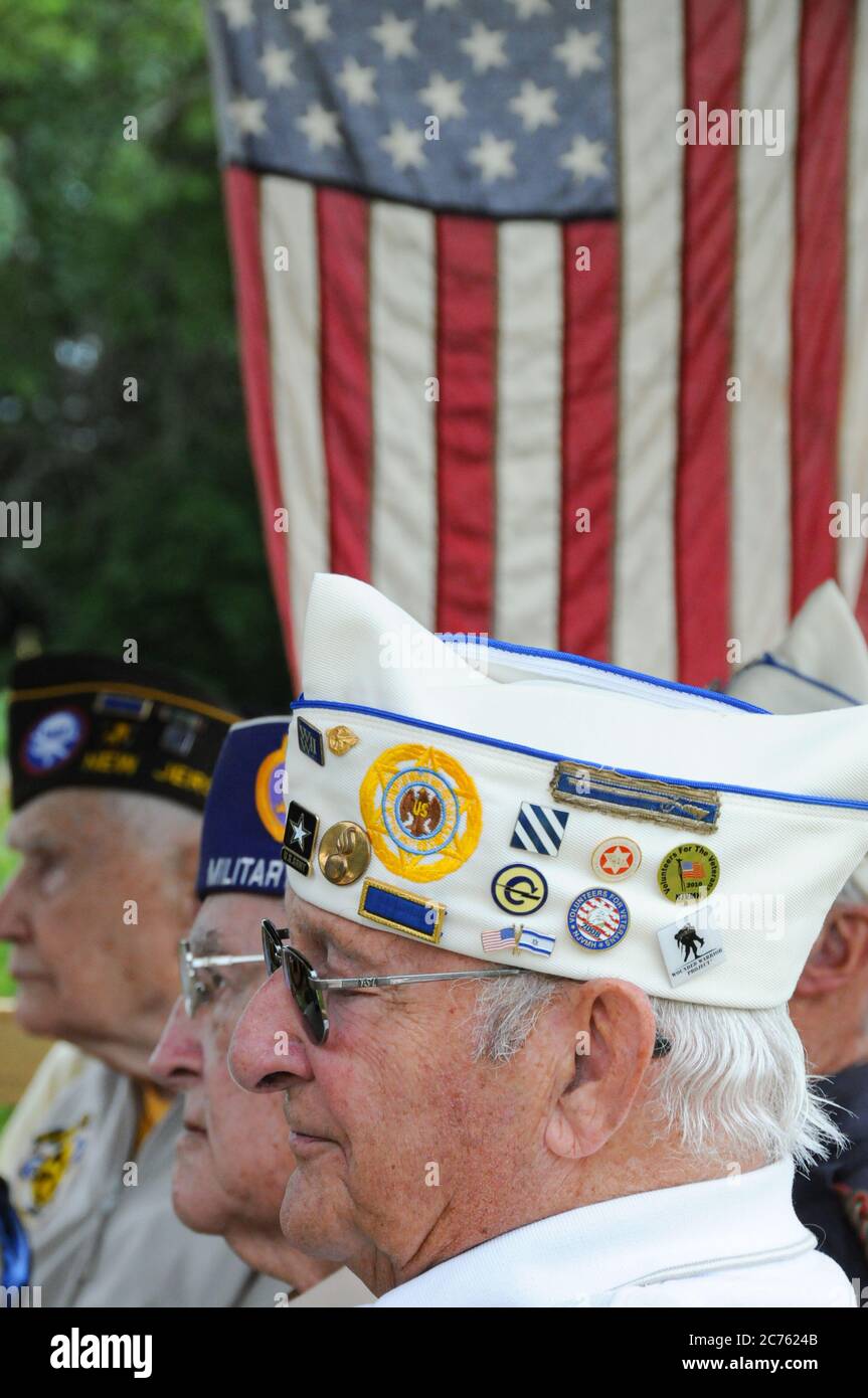 Profile World War II veterans attend a Memorial Day ceremony with the ...