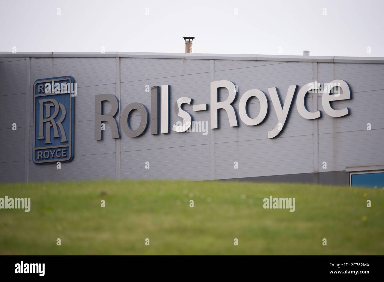 Inchinnan, Scotland, UK. 14th July, 2020. Pictured: Rolls Royce factory situated to the north side of Glasgow Airport is to cut 700 jobs - more than half of the 1,300-strong workforce, blaming the global downturn due to the coronavirus (COVID19) crisis. Rolls Royce which supplies aircraft engines, is cutting back on staff, as airlines having to ground a huge portion of their fleet of aircraft and cutting back or cancelling new aircraft orders, has caused a massive knock on effect in the global aviation industry. Credit: Colin Fisher/Alamy Live News Stock Photo