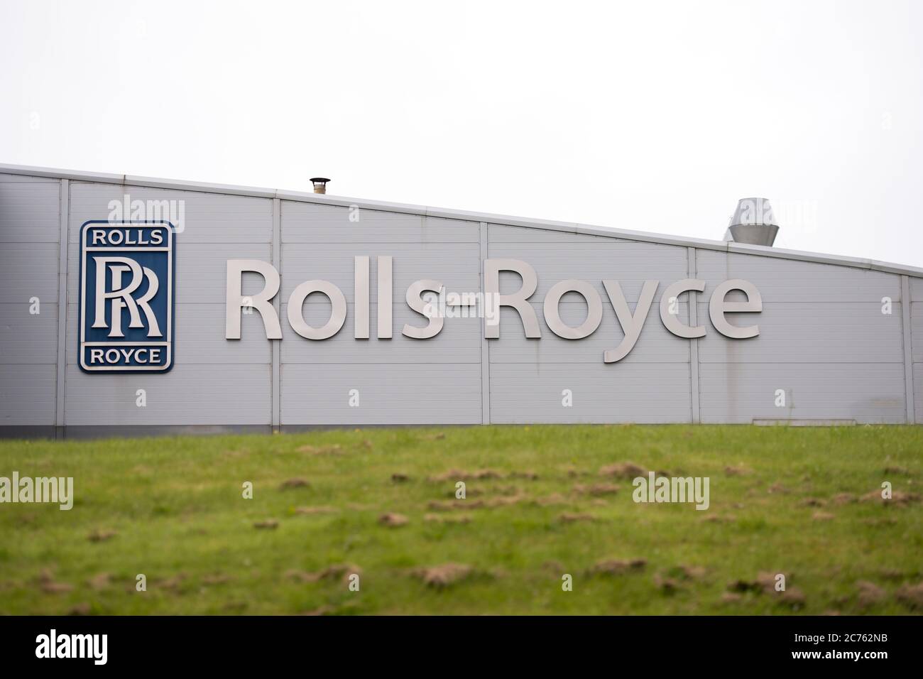 Inchinnan, Scotland, UK. 14th July, 2020. Pictured: Rolls Royce factory situated to the north side of Glasgow Airport is to cut 700 jobs - more than half of the 1,300-strong workforce, blaming the global downturn due to the coronavirus (COVID19) crisis. Rolls Royce which supplies aircraft engines, is cutting back on staff, as airlines having to ground a huge portion of their fleet of aircraft and cutting back or cancelling new aircraft orders, has caused a massive knock on effect in the global aviation industry. Credit: Colin Fisher/Alamy Live News Stock Photo