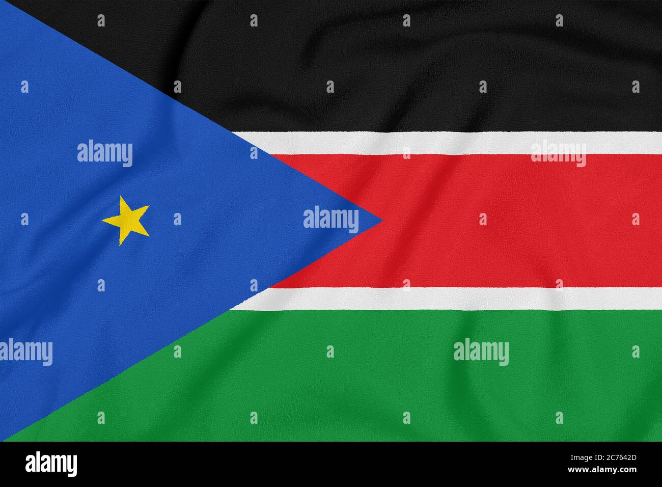 Flag of South Sudan on textured fabric. Patriotic symbol Stock Photo