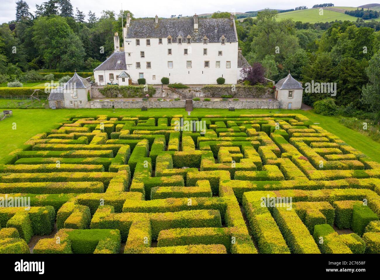 Innerleithen, Scotland, UK. 14 July, 2020, Aerial view of maze at Traquair House in the Scottish Borders, the oldest inhabited house in Scotland. The house is preparing to reopen to the public on Friday. Access to the maze will be limited to one household at a time. Iain Masterton/Alamy Live News Stock Photo