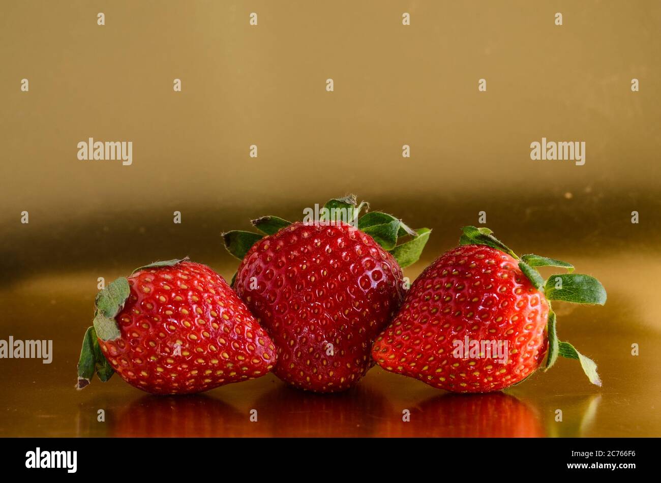 Fresh Ripe Strawberry Fruit on a Colored Background Stock Photo - Alamy