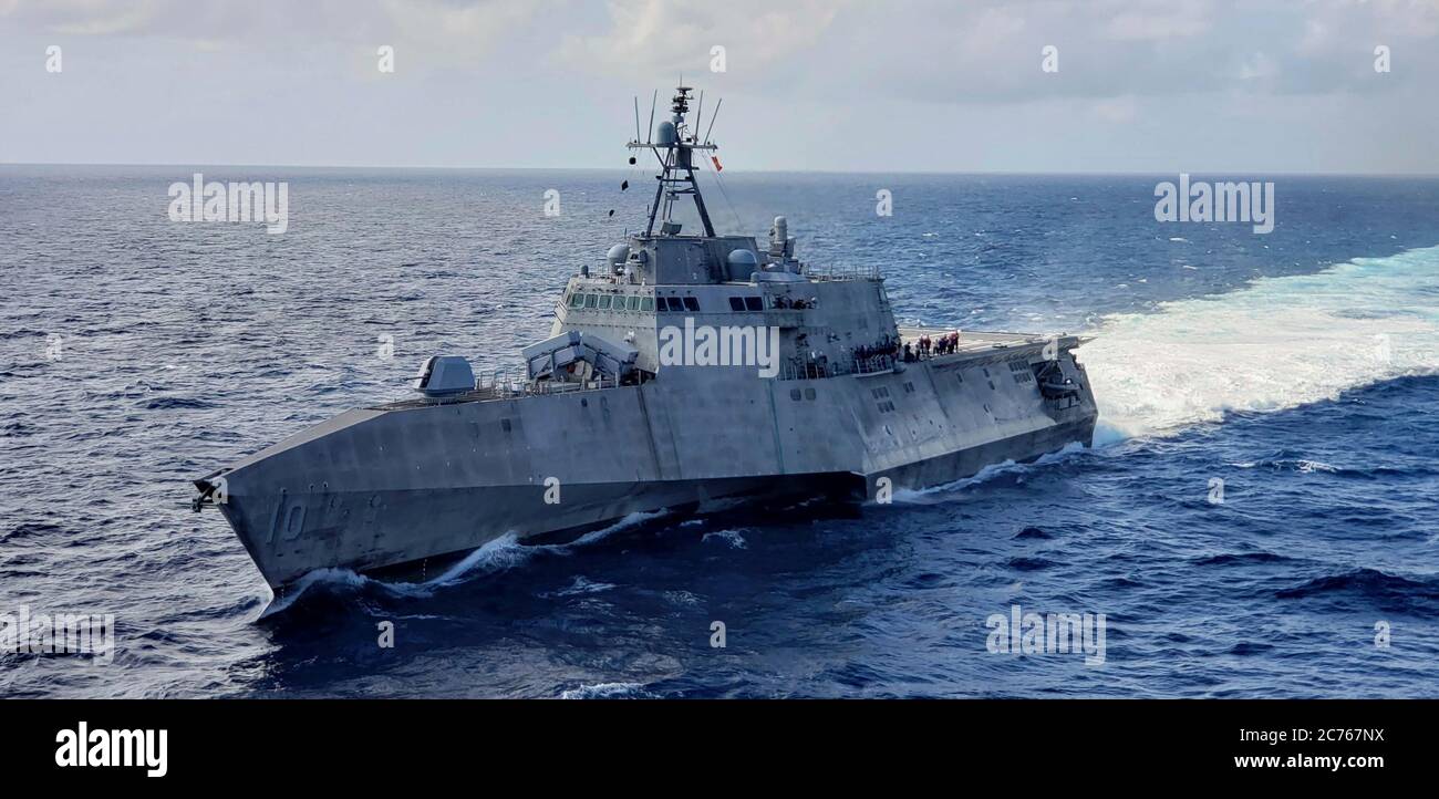 The U.S. Navy Independence-variant littoral combat ship USS Gabrielle Giffords during a presence patrol in international waters December 21, 2019 in the South China Sea. Stock Photo