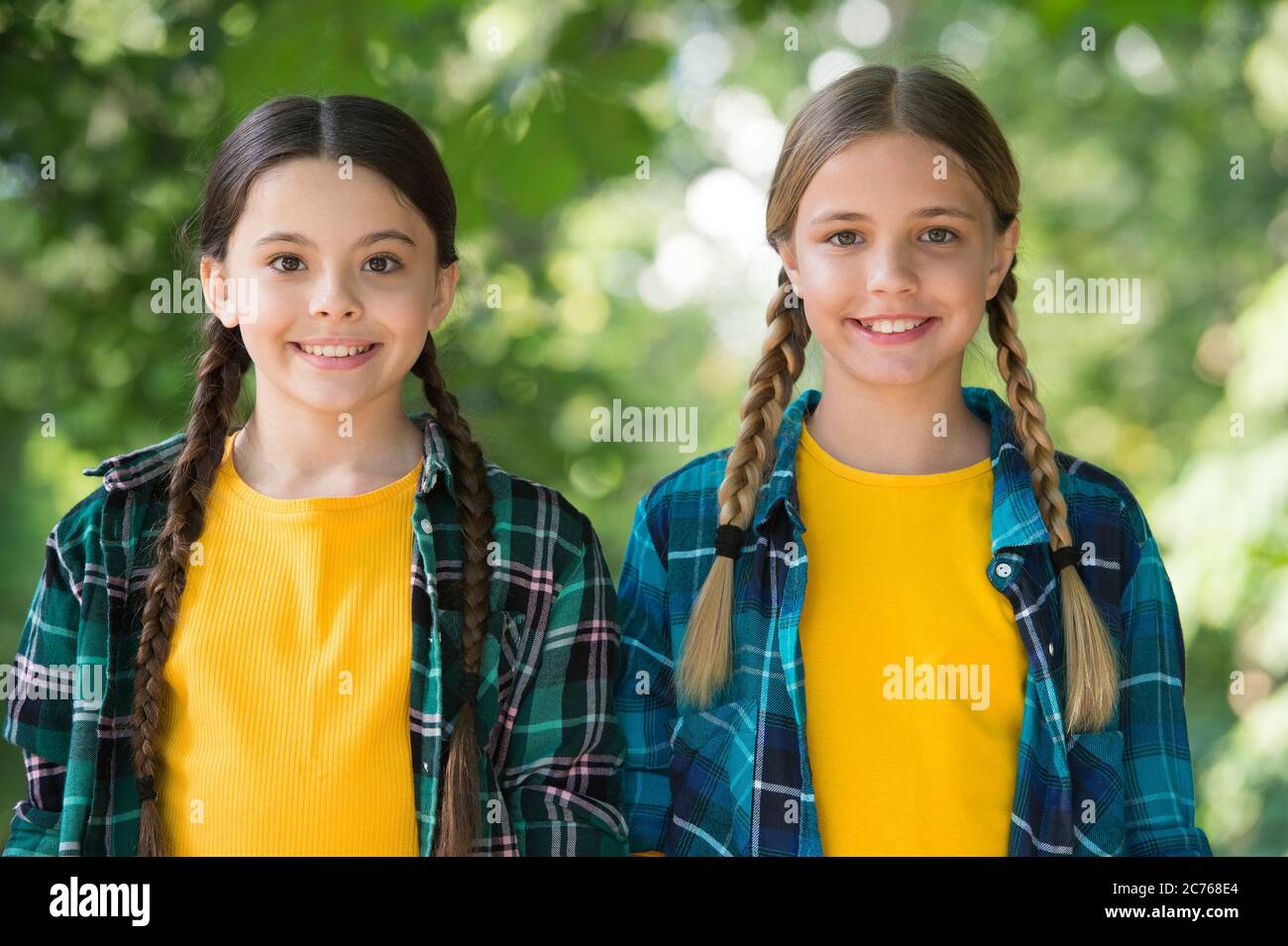 As distinctive as you are. Happy children smile sunny outdoors. Little children enjoy summer holidays. Beauty look of small children. Casual style trend. Happy childhood. International childrens day. Stock Photo