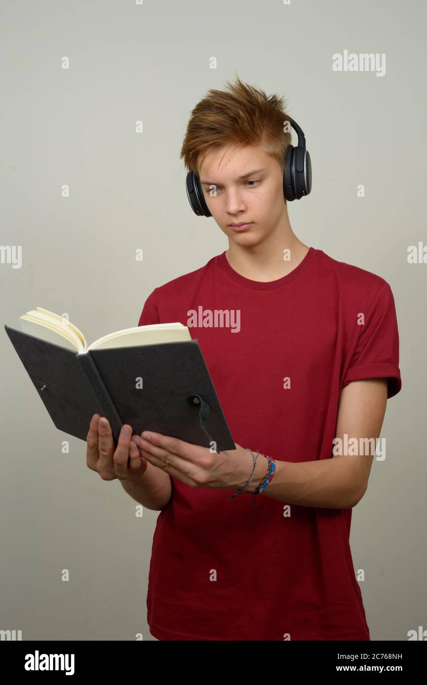 Portrait of young handsome teenage boy with blond hair Stock Photo - Alamy