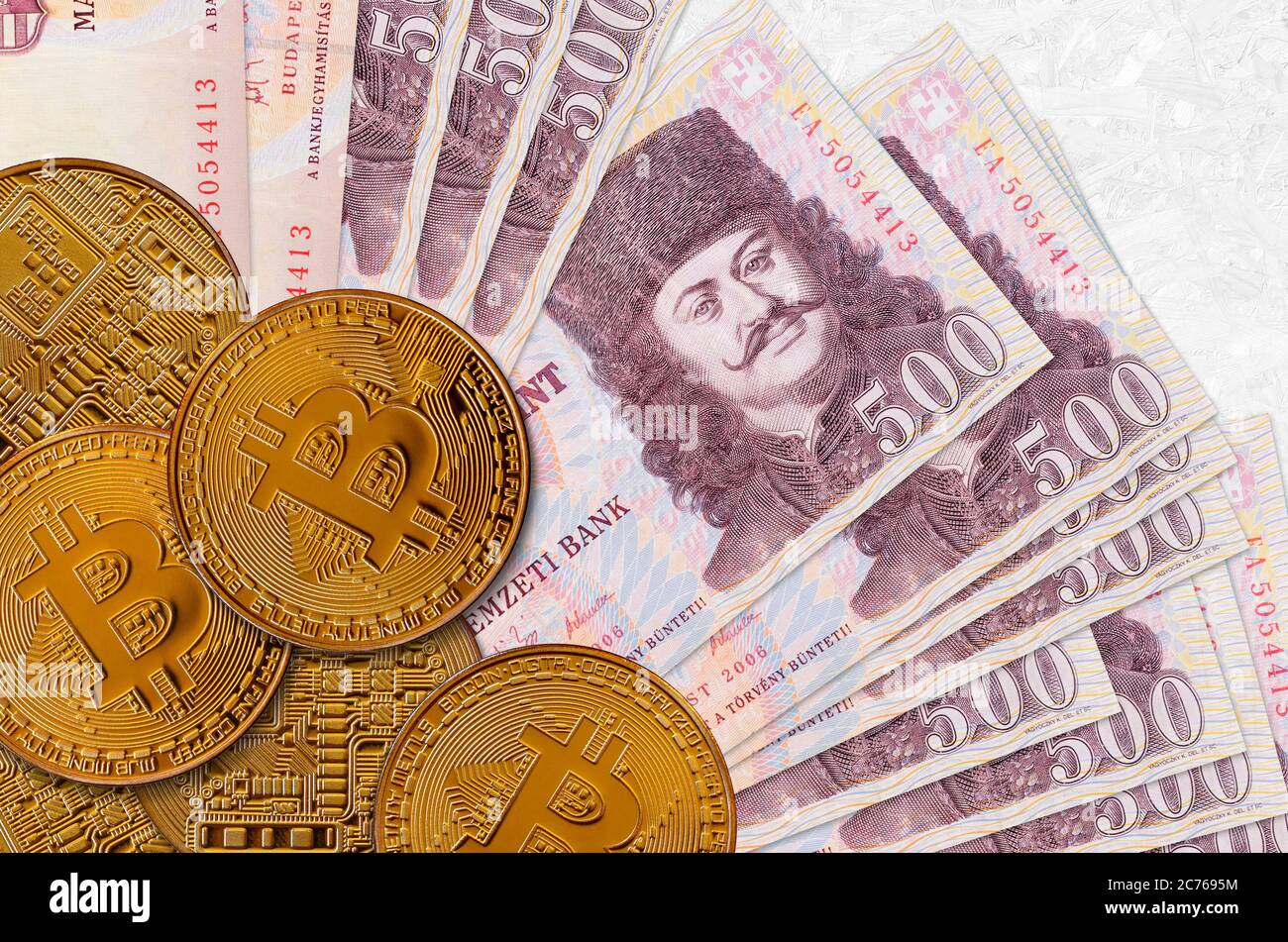 500 Hungarian forint bills and golden bitcoins. Cryptocurrency investment  concept. Crypto mining or trading transactions Stock Photo - Alamy
