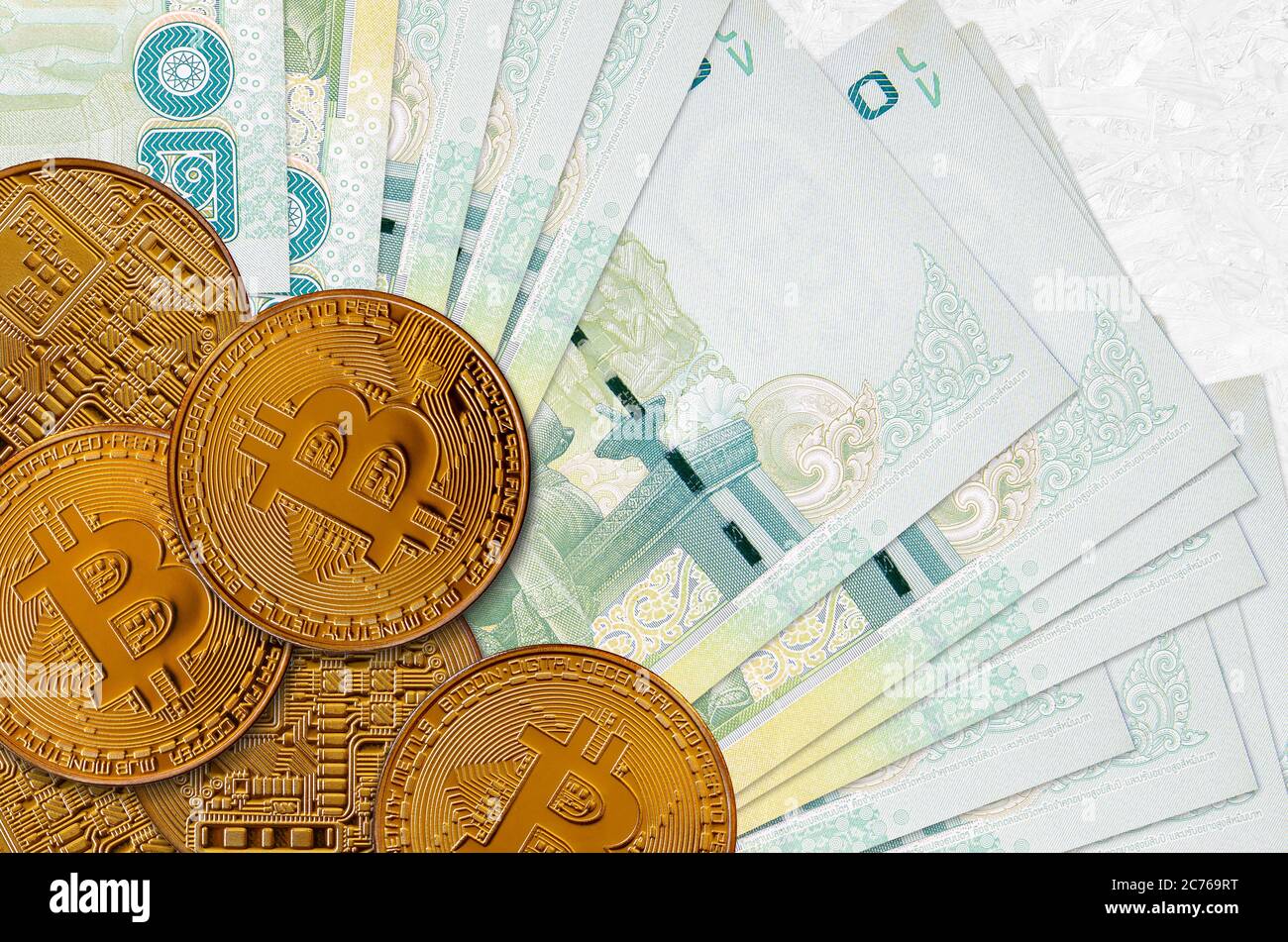 20 Thai Baht bills and golden bitcoins. Cryptocurrency investment concept.  Crypto mining or trading transactions Stock Photo - Alamy