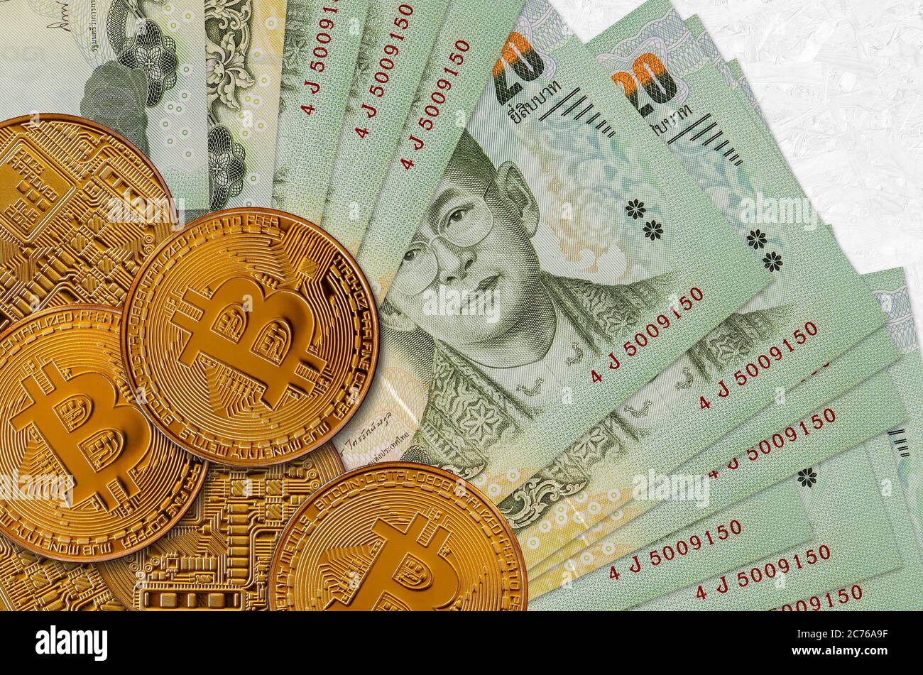 20 Thai Baht bills and golden bitcoins. Cryptocurrency investment concept.  Crypto mining or trading transactions Stock Photo - Alamy