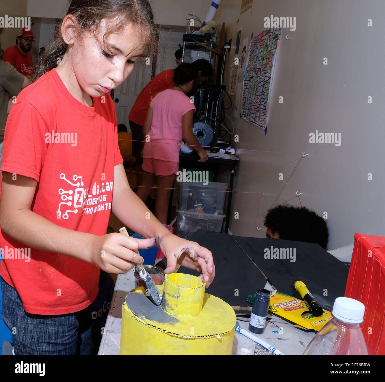 Day Camp. Brooklyn, NY. Preteen girl painting. Stock Photo