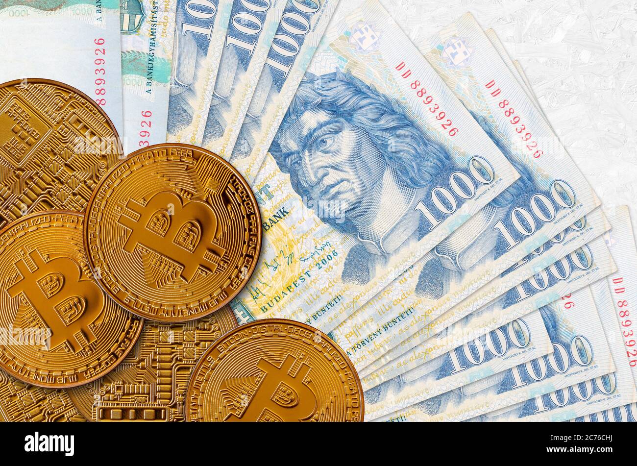 1000 Hungarian forint bills and golden bitcoins. Cryptocurrency investment  concept. Crypto mining or trading transactions Stock Photo - Alamy