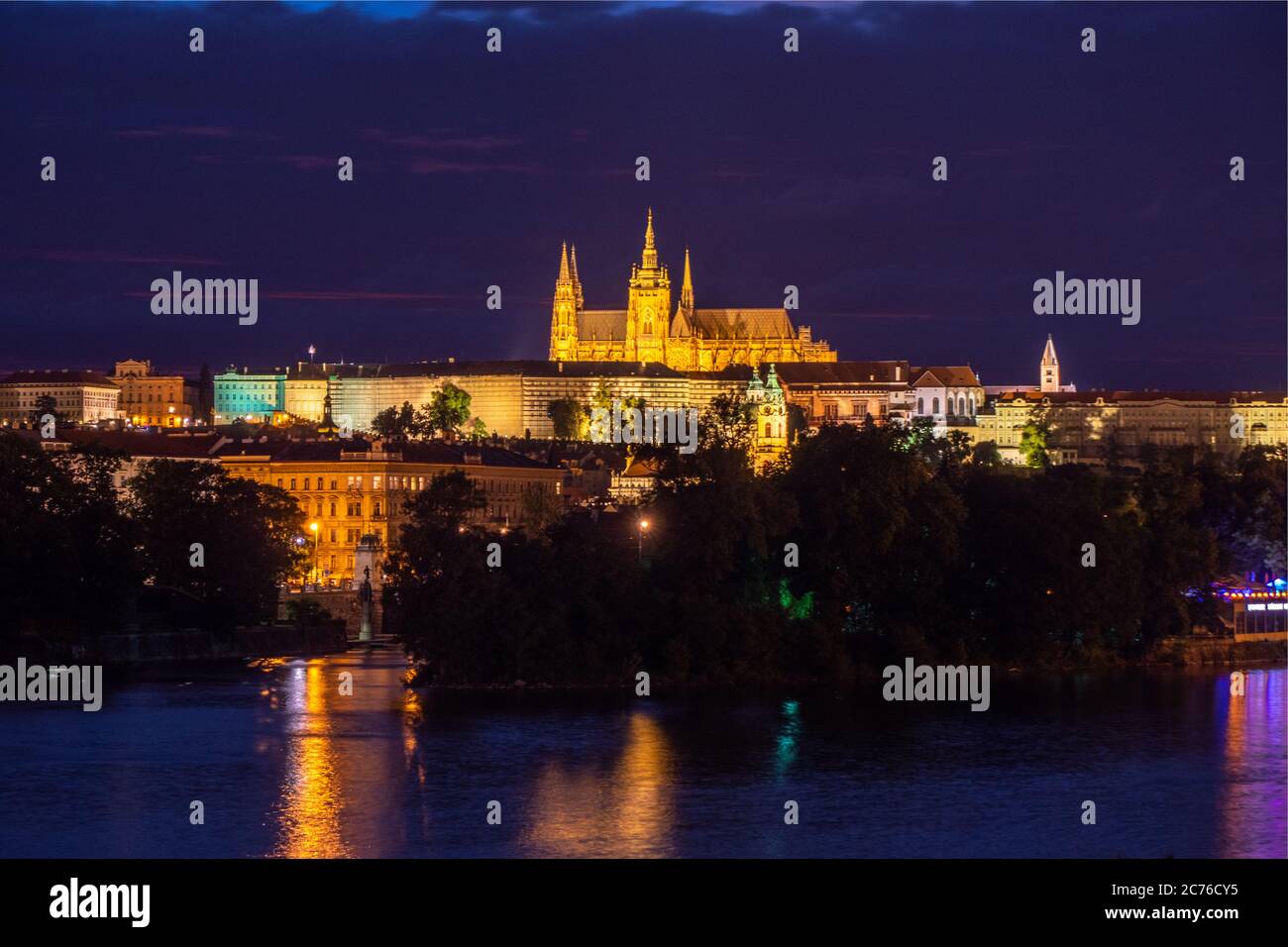 Saint Vitus Cathedral on Prague Castle, River Vltava and Hradcany District  at Night in HDR Stock Photo