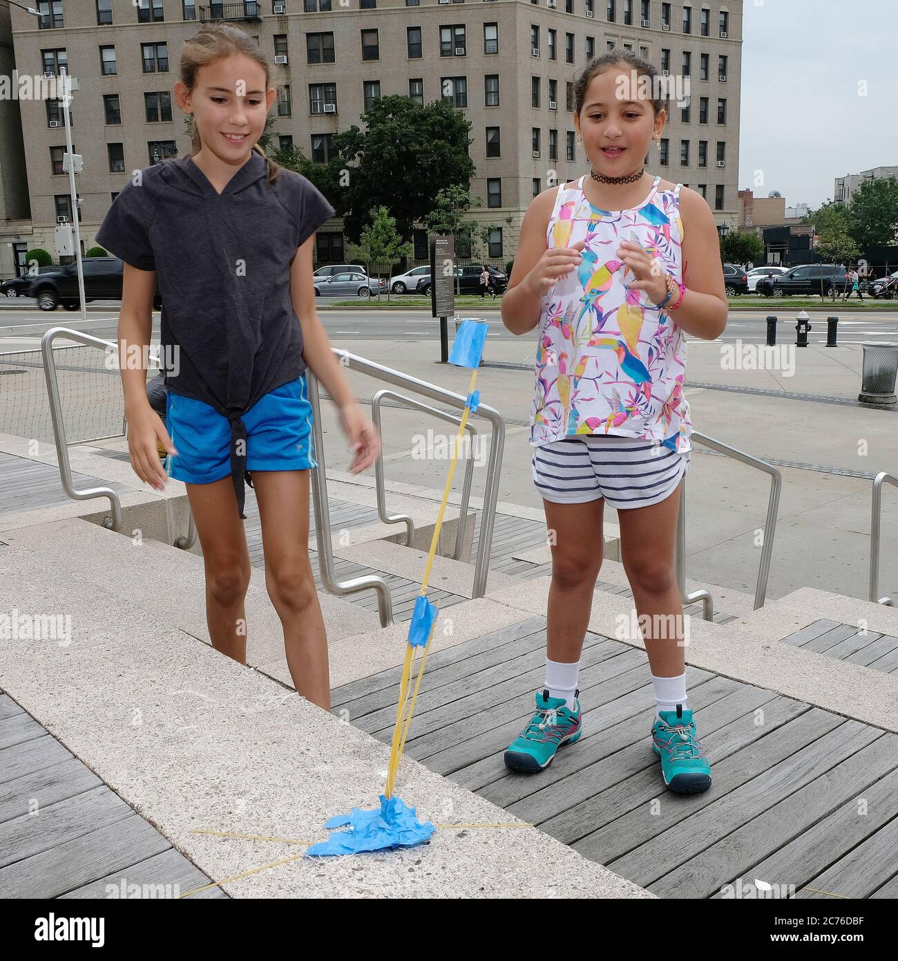 Day Camp, Brooklyn, New York City. Kids build towers out of spaghetti to learn about teamwork and balance. Model-Released. Stock Photo