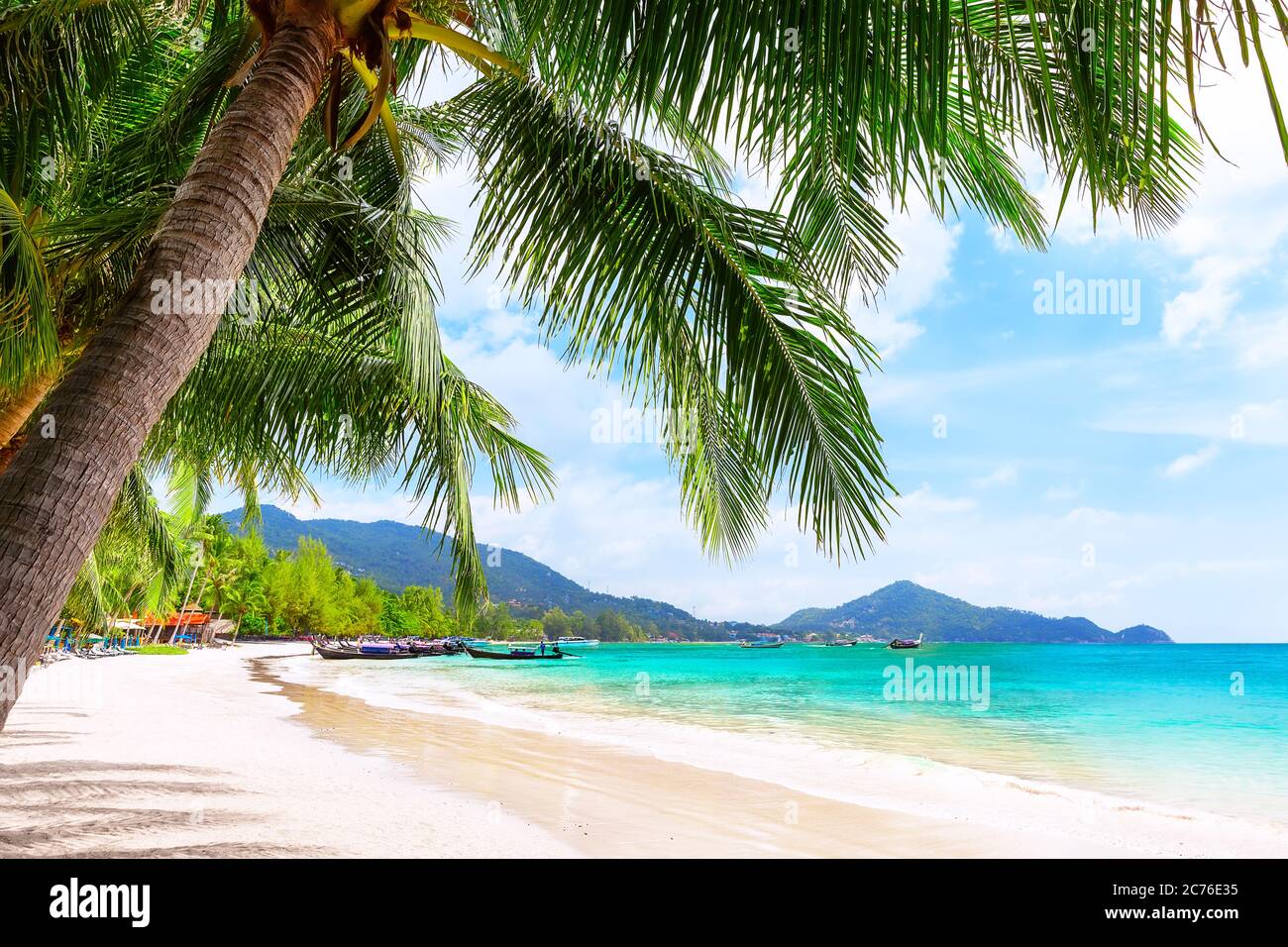 Blue sky and beautiful sand beach in Koh Tao, Thailand. Vacation holidays background wallpaper. View of nice tropical beach. Travel summer holiday bac Stock Photo