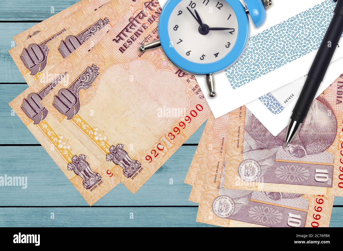 Time money concept clock indian hires stock photography and images Alamy