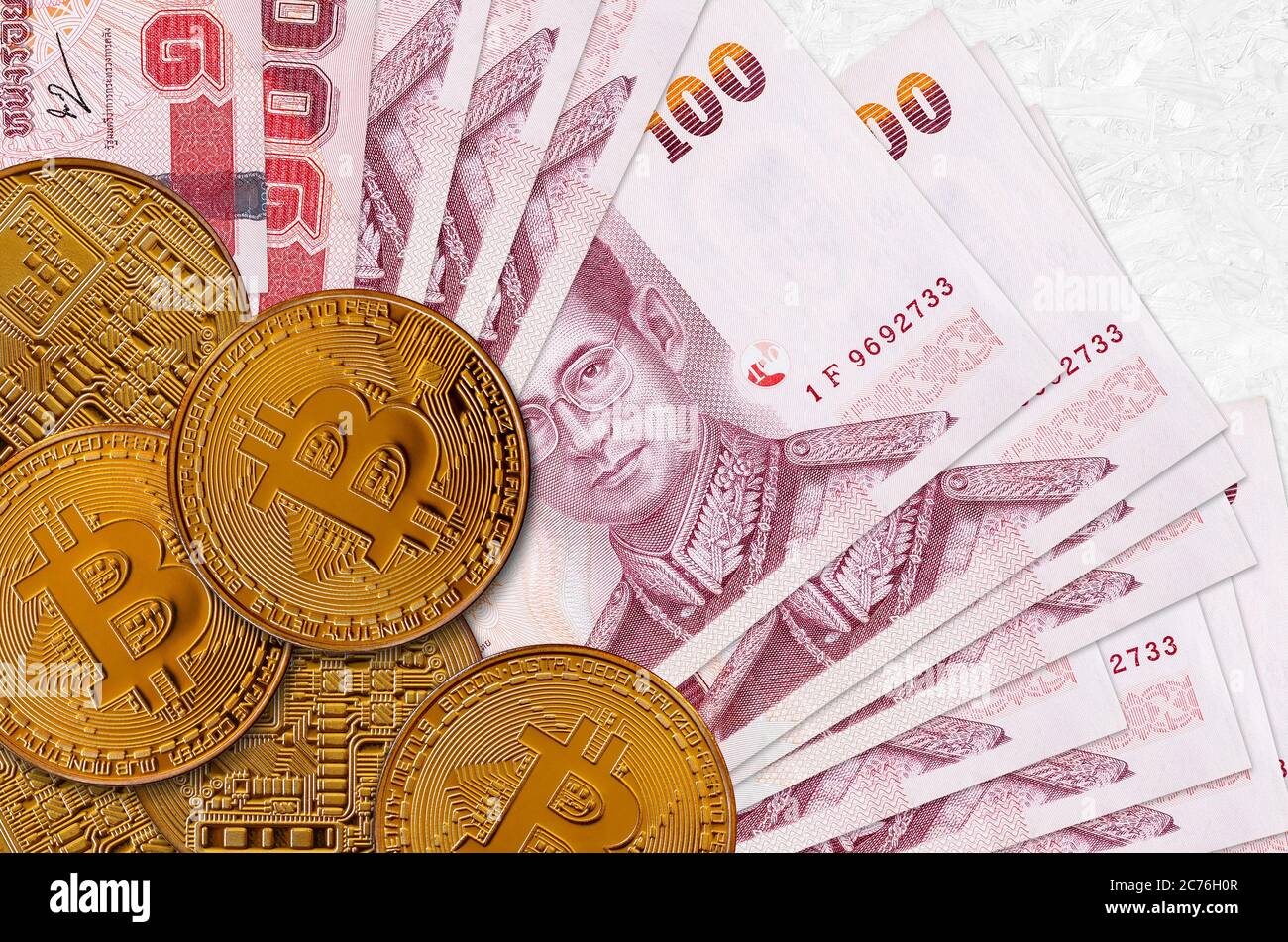 100 Thai Baht bills and golden bitcoins. Cryptocurrency investment concept.  Crypto mining or trading transactions Stock Photo - Alamy
