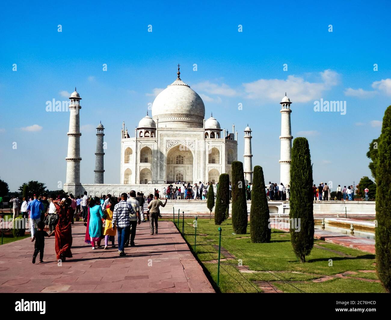 Indian tourists at the Taj Mahal in Agra, Uttar Pradesh, India. One of the New Seven Wonders of the World and UNESCO world heritage site. Stock Photo