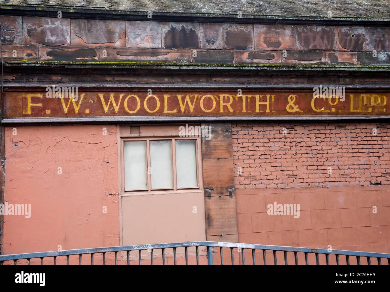 Faded Ghost Sign on former F W Woolworth building in Glasgow Scotland Stock Photo