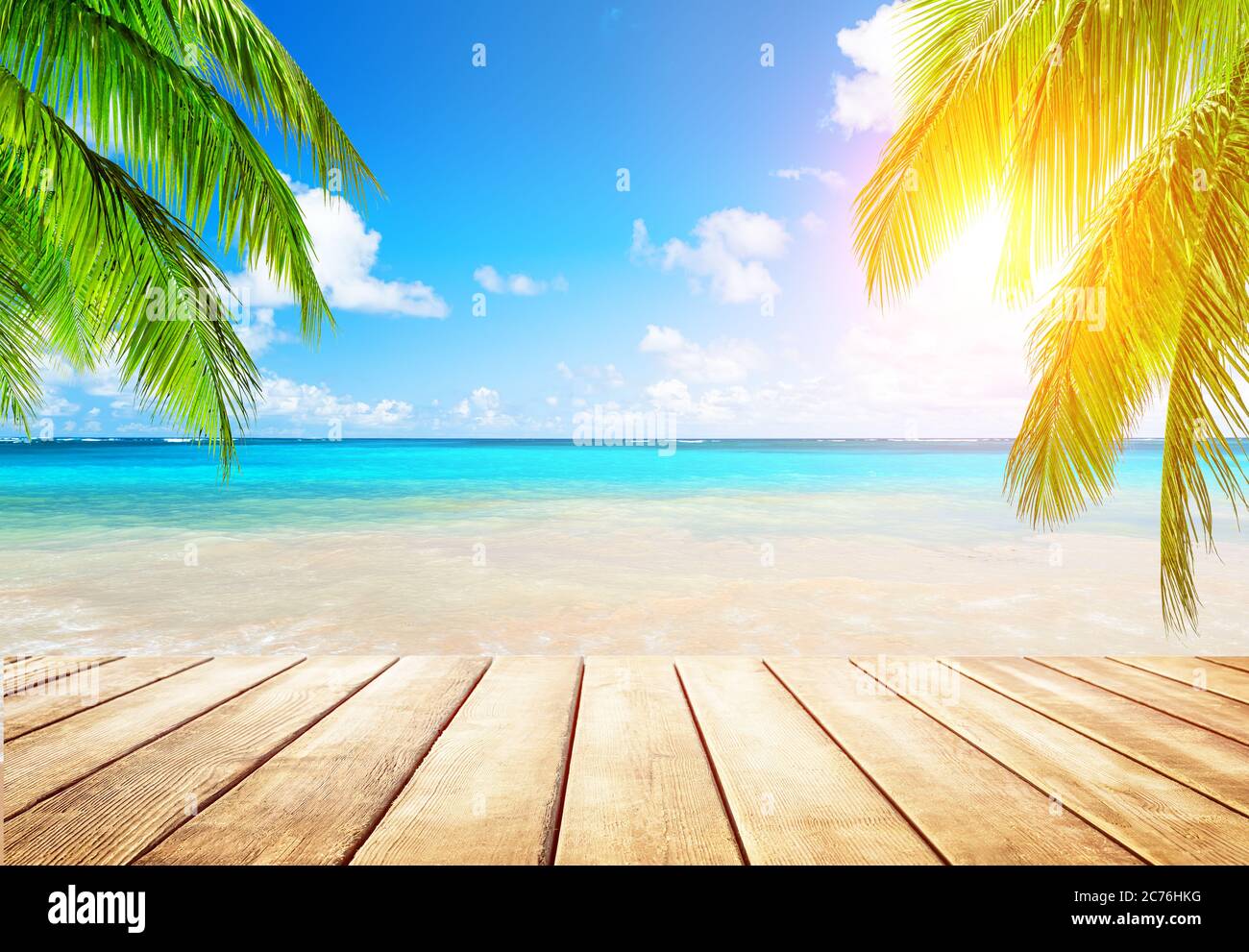 Coconut palm trees against blue sky and beautiful beach in Punta Cana