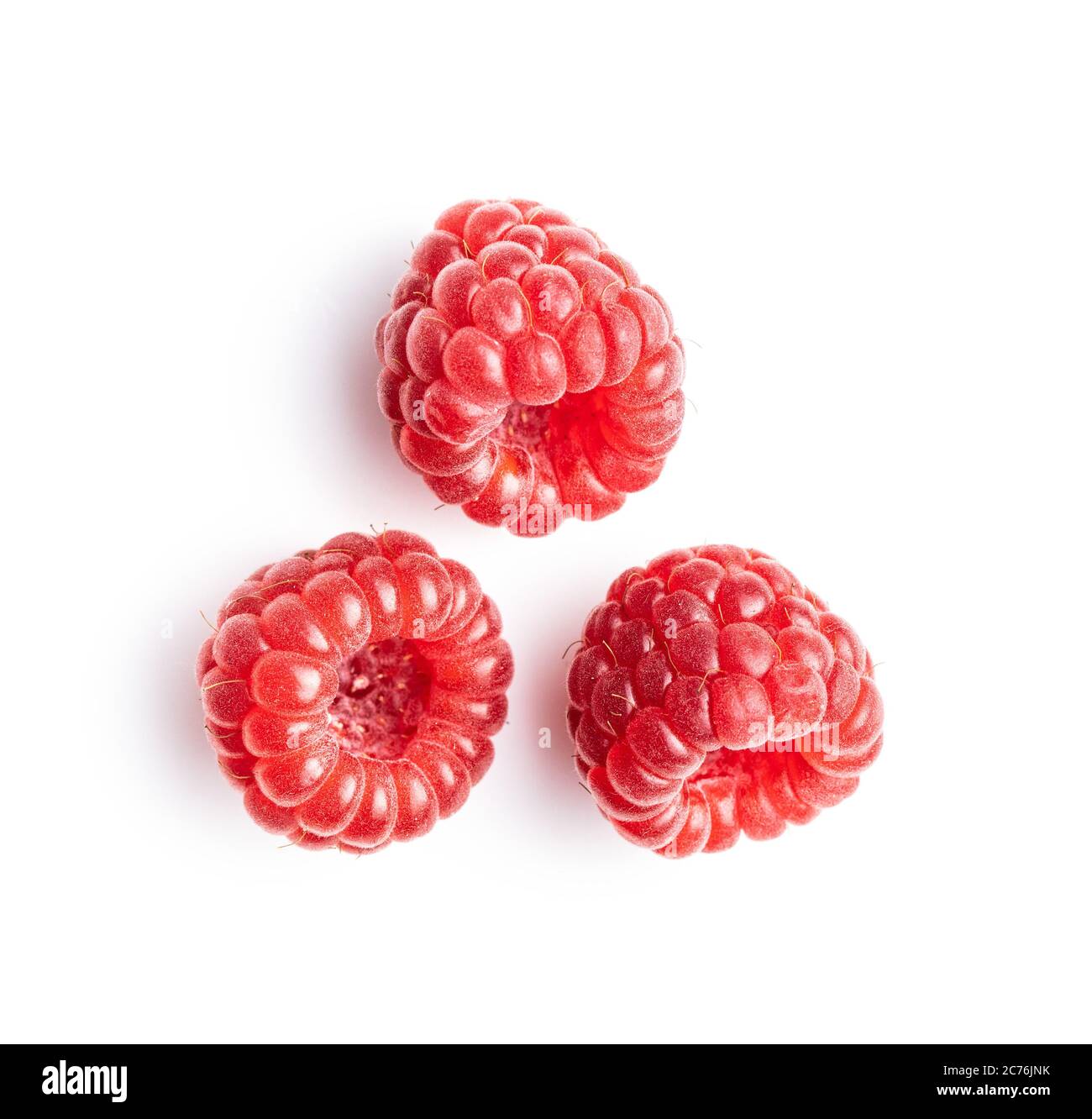 Ripe red raspberries isolated on white background. Stock Photo