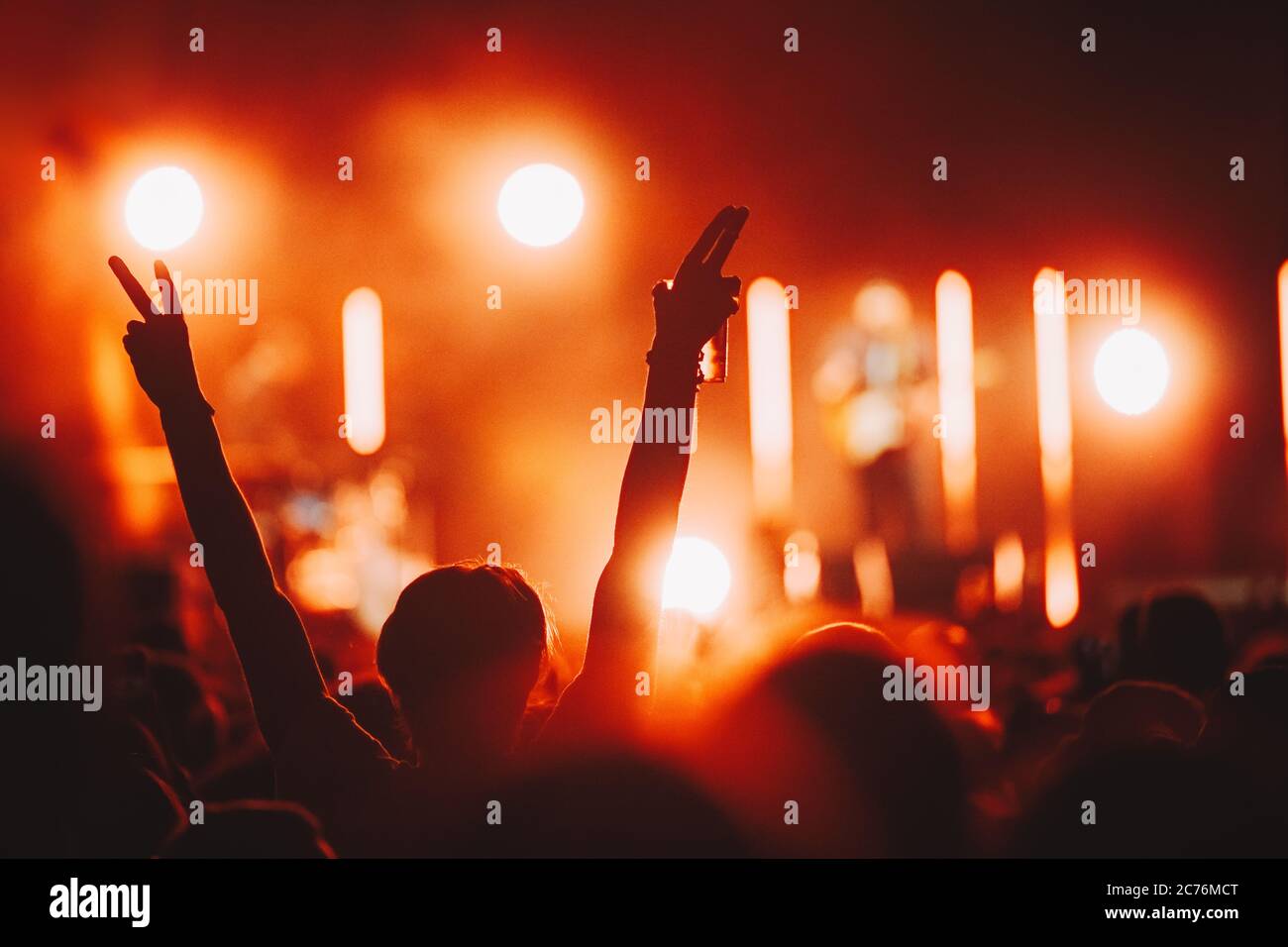 Concert crowd cheering hands up hi-res stock photography and images - Alamy