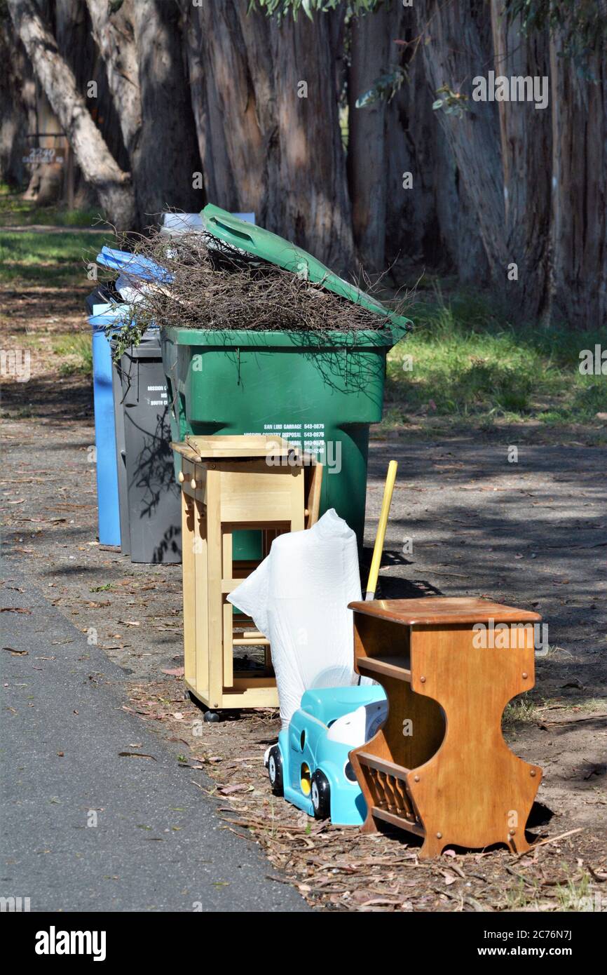 Trash pickup day with treasures from a home in California Stock Photo