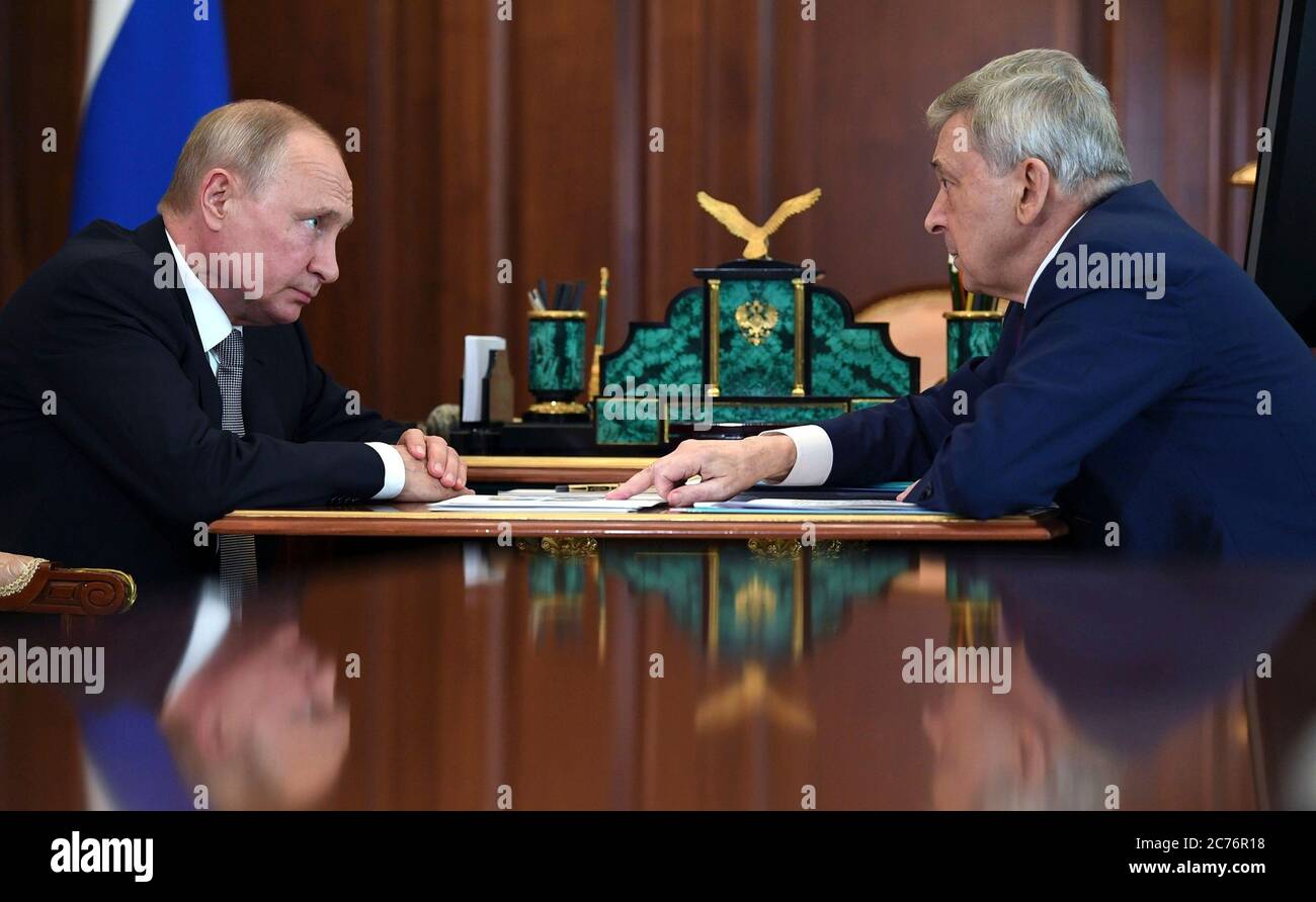 Moscow, Russia. 14th July, 2020. Russian President Vladimir Putin, holds a face to face meeting with Ivan Dedov, President of the National Medical Research Centre for Endocrinology to discuss the COVID-19, coronavirus pandemic at the Kremlin July 14, 2020 in Moscow, Russia. Credit: Alexei Nikolsky/Kremlin Pool/Alamy Live News Stock Photo