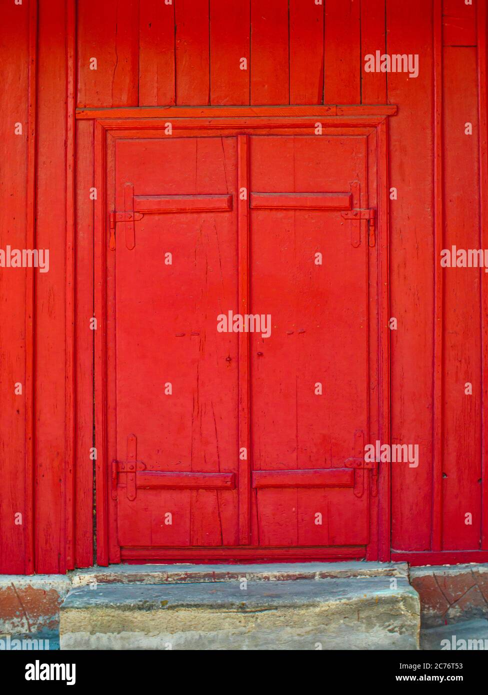 Old red door made of wood Stock Photo