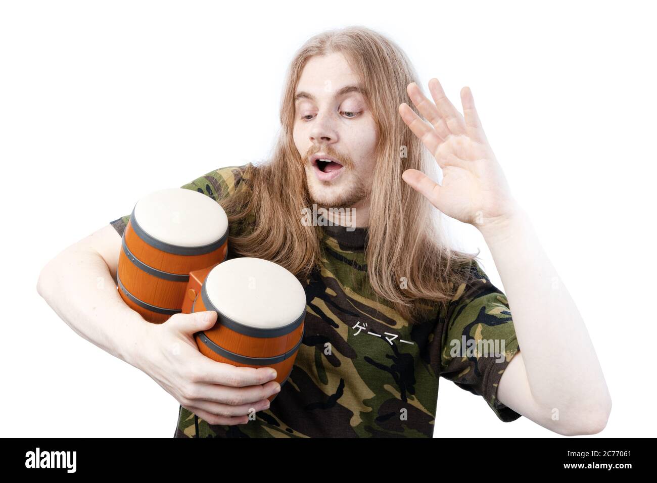 Long Haired Gamer Playing Video Game Drums Controller Stock Photo