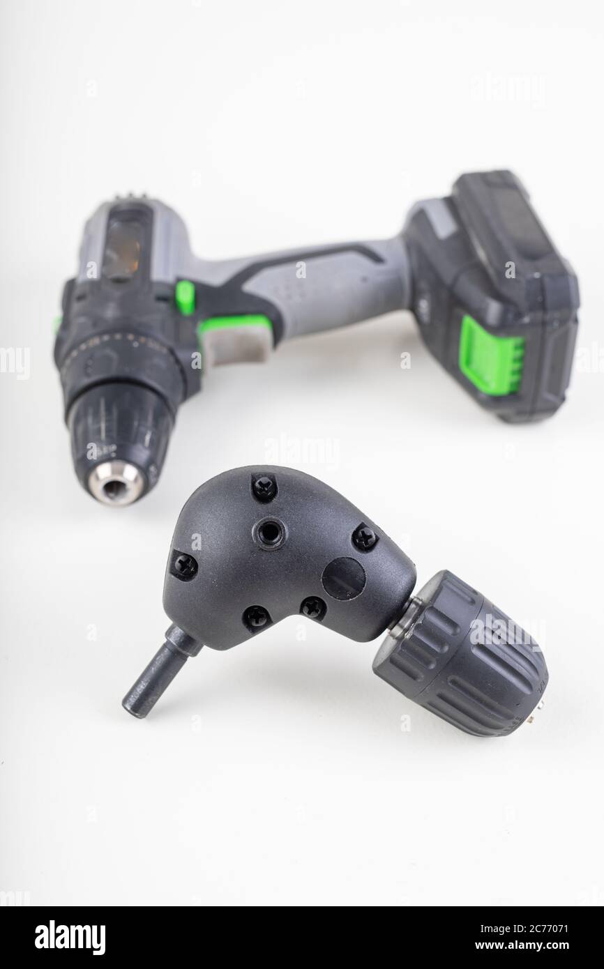 Screwdriver and angular gear. Special tools in a carpentry workshop ...