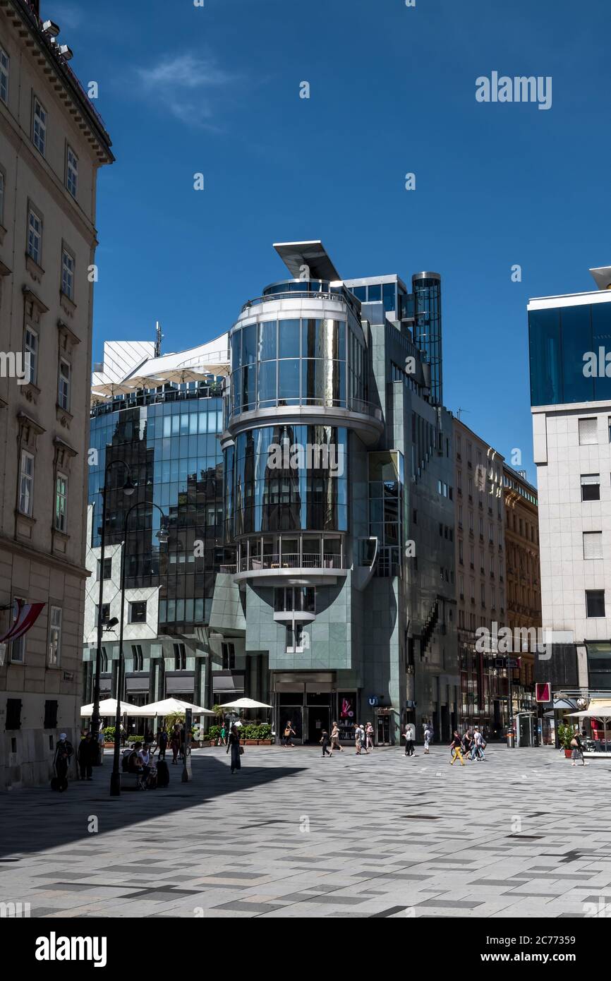 VIENNA, AUSTRIA - JULY 02, 2020: Famous Haas Haus, Modern Building Designed By Hans Hollein In The Inner City Of Vienna In Austria Stock Photo